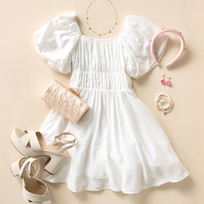 white outfit laid out